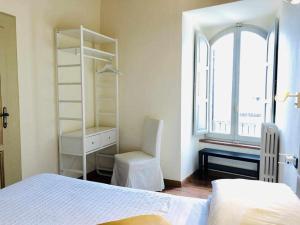 Postel nebo postele na pokoji v ubytování Mavitur Rooms Assisi
