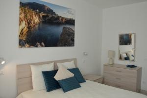Postel nebo postele na pokoji v ubytování PESCA AZZURRA