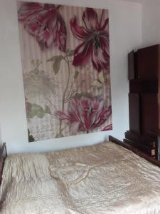Letto o letti in una camera di Guest House Buche 219