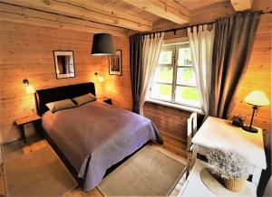 Cama o camas de una habitación en Vidugiris Lake