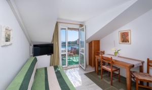 TV/Unterhaltungsangebot in der Unterkunft Apartments Katica