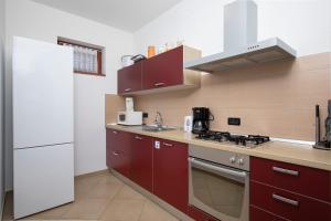 Kuchyň nebo kuchyňský kout v ubytování Villa Zuccon