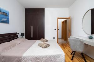 Postel nebo postele na pokoji v ubytování Villa Zuccon