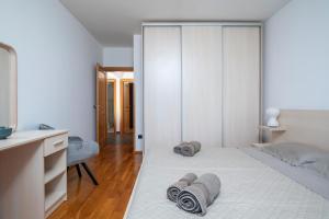 Postel nebo postele na pokoji v ubytování Villa Zuccon