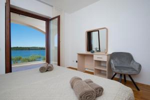 Postel nebo postele na pokoji v ubytování Villa Zuccon