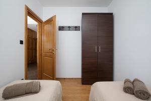 Postel nebo postele na pokoji v ubytování Villa Zuccon