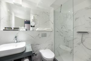 Phòng tắm tại Camera Hotel