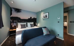 Giường trong phòng chung tại Camera Hotel