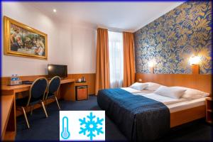 Ένα ή περισσότερα κρεβάτια σε δωμάτιο στο Hotel ATLANTA Darmstadt