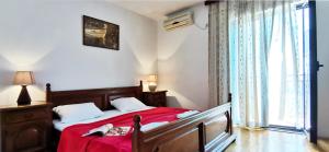 Voodi või voodid majutusasutuse Apartments and rooms Marija toas