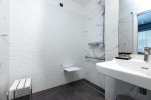 Phòng tắm tại Camera Hotel