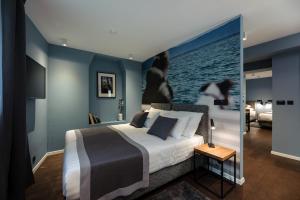 Giường trong phòng chung tại Camera Hotel