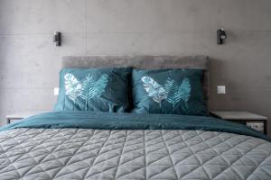 Postel nebo postele na pokoji v ubytování Apartament Natural 305 z widokiem na morze