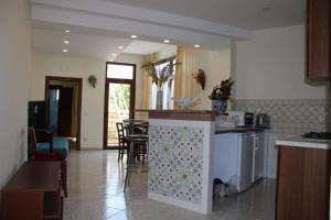 A kitchen or kitchenette at Casa Angelina