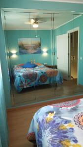 Łóżko lub łóżka w pokoju w obiekcie Semi-detached Adosado con Encanto -130 m2 - WiFi 600 Mb - Piscina Comunitaria - Patio Privado