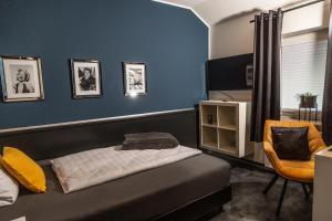 Säng eller sängar i ett rum på Aparthotel Menden