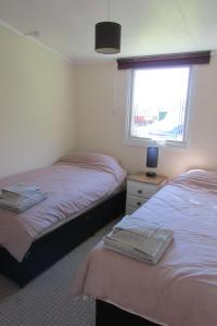 Katil atau katil-katil dalam bilik di Golygfa'r Cwm