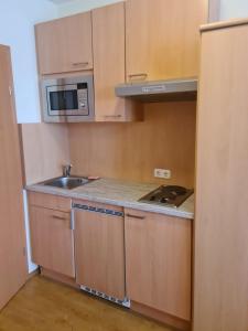 A kitchen or kitchenette at Hotel Wirt im Feld