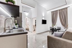 Televisyen dan/atau pusat hiburan di UnoSeiTre - Luxury Apartment & Suite