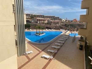 Bazén v ubytovaní Residencias Sol Paraiso alebo v jeho blízkosti
