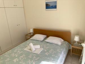 Letto o letti in una camera di Villa Elani
