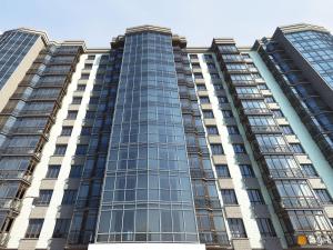 a tall building with glass windows at PremierAtlant in Dnipro