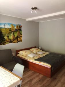 Pokoje Beata tesisinde bir odada yatak veya yataklar