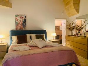 เตียงในห้องที่ Casa Vacanza indipendente 53 mq Puglia