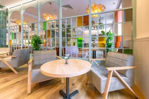 Χώρος καθιστικού στο Stadtoase Kolping Hotel