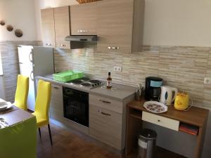 Kuchyň nebo kuchyňský kout v ubytování Apartments Ankica