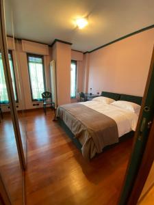 Postel nebo postele na pokoji v ubytování Porta San Felicianetto Holiday Home