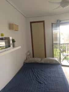 Posteľ alebo postele v izbe v ubytovaní Estudio Sota-Piscina