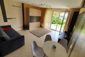 Posedenie v ubytovaní Igényes 4 fős apartman közvetlen a strandnál