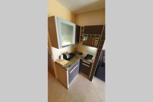 Kuchyňa alebo kuchynka v ubytovaní Igényes 4 fős apartman közvetlen a strandnál + 13 fotografií