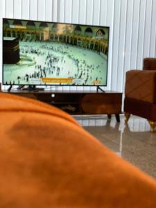TV a/nebo společenská místnost v ubytování عال للوحدات السكنيه