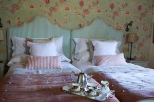 Cama o camas de una habitación en Helguera Palacio Boutique & Antique