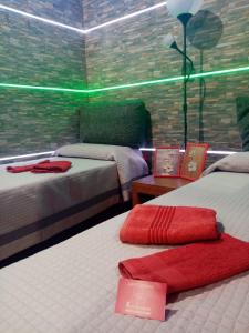 Postel nebo postele na pokoji v ubytování Agriturismo Rosso Lampone + 37 fotografií