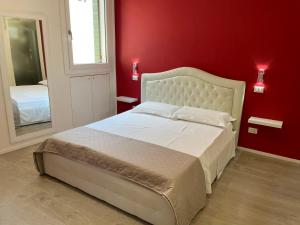 Posteľ alebo postele v izbe v ubytovaní A&F Apartment Padova centro storico
