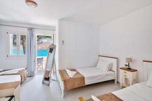 Posteľ alebo postele v izbe v ubytovaní ''Di Mare'' Hotel & Suites