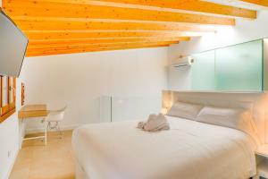 Posteľ alebo postele v izbe v ubytovaní Duplex Palma Apartment - with garage