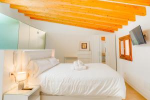 Posteľ alebo postele v izbe v ubytovaní Duplex Palma Apartment - with garage