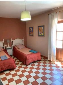 Postel nebo postele na pokoji v ubytování Casa Rural Hotel La Placeta AYORA