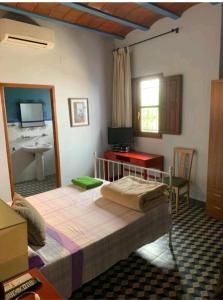 Postel nebo postele na pokoji v ubytování Casa Rural Hotel La Placeta AYORA