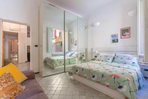 A bed or beds in a room at Bologna tra Centro e Universita' Apartment