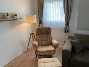 Posezení v ubytování Gemütliche Dachgeschosswohnung