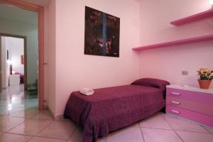 A bed or beds in a room at Sea View - Rena Bianca