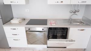 Η κουζίνα ή μικρή κουζίνα στο APP4RENT - Appartamento Alghe Rosse