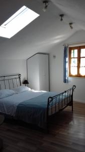Postel nebo postele na pokoji v ubytování Apartments MIME - Small House