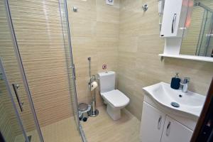 Koupelna v ubytování Apartments Daki + 37 fotografií