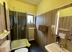 
Ein Badezimmer in der Unterkunft Hotel Auermühle
